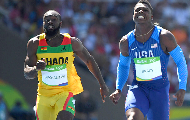 Ghana’s sprinter Sean Safo-Antwi (left) racing in his 100m heats